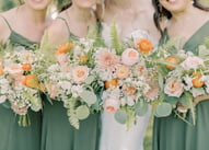 wedding flower bouquets held by bride and bridesmaids