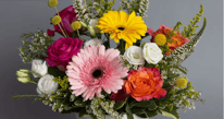 mothers day flower bouquet with sunflowers, pink hydrangeas, tulips, white roses