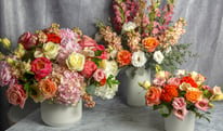 fresh local flowers in vase, orange and white and yellow colors