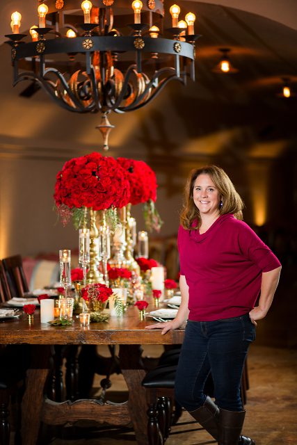 Owner and Director of Blooms at J. Morris Flowers designed this crimson inspired table. 