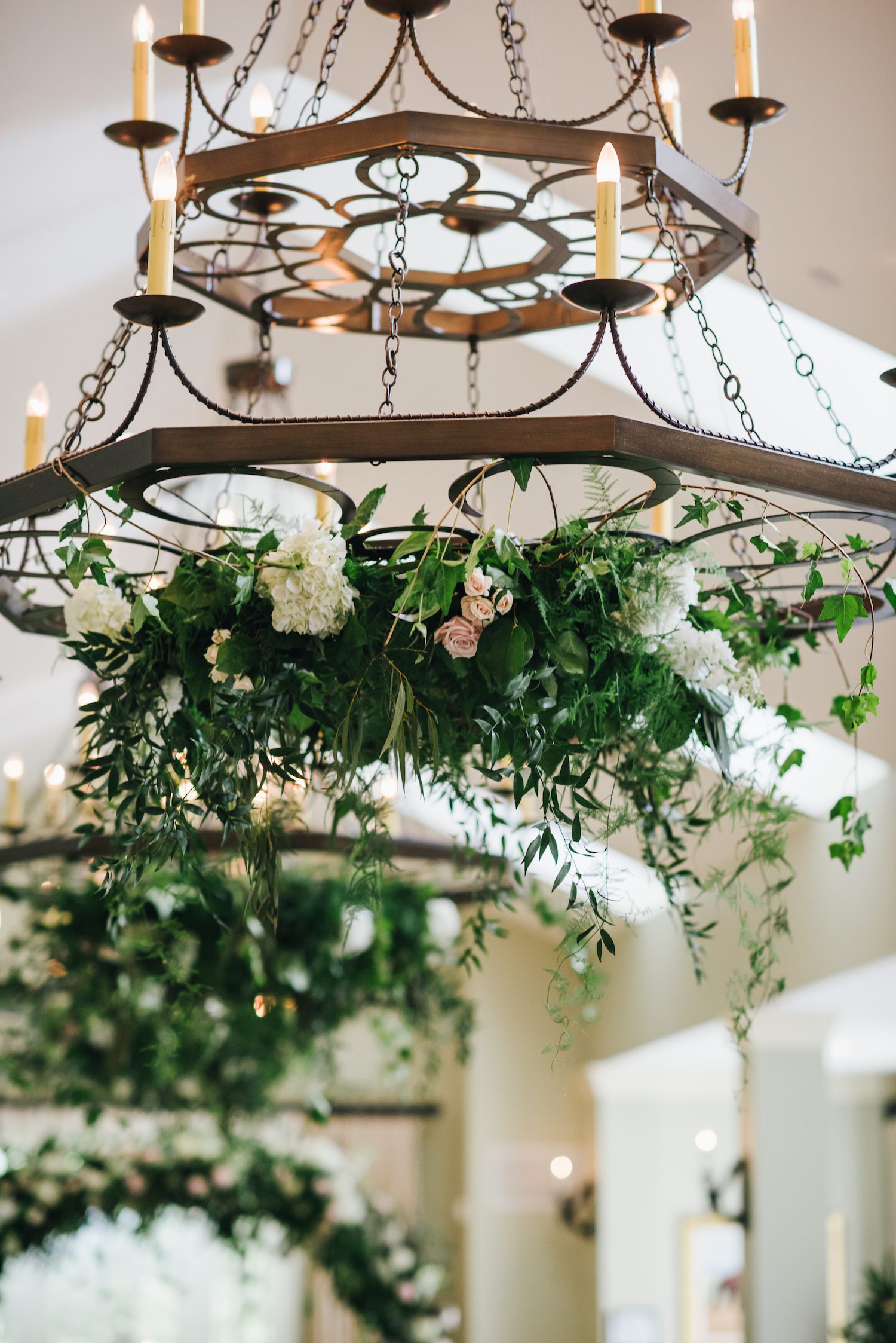 Hanging chandeliers and a circular arch at Salamander Resort and Spa. Photography by Chi Chi Ari.