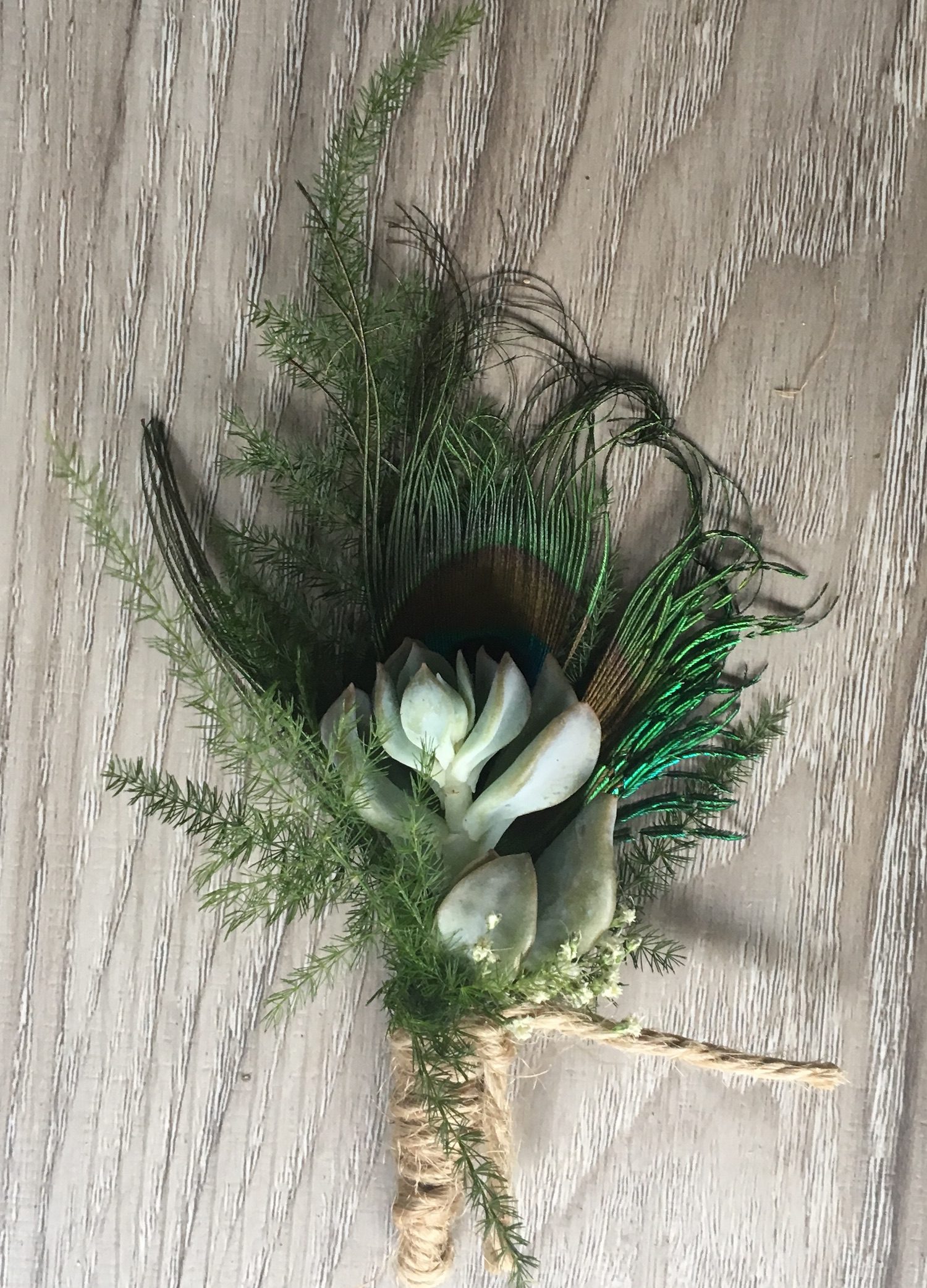 The Boutonniere with Peacock Feather for a hint of teal.