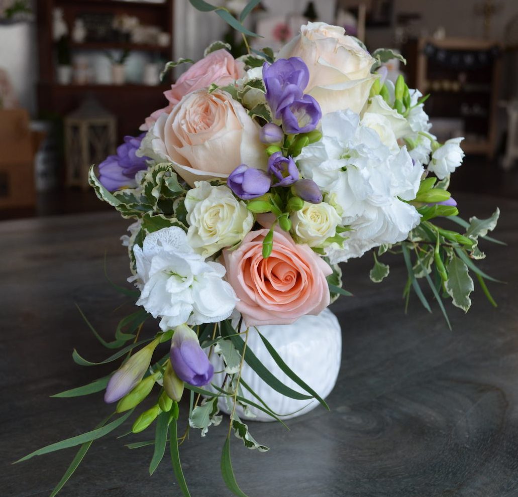 Our own "Pippa" inspired bouquet sitting in a white porcelain vase. Click here to view a photo of the original.