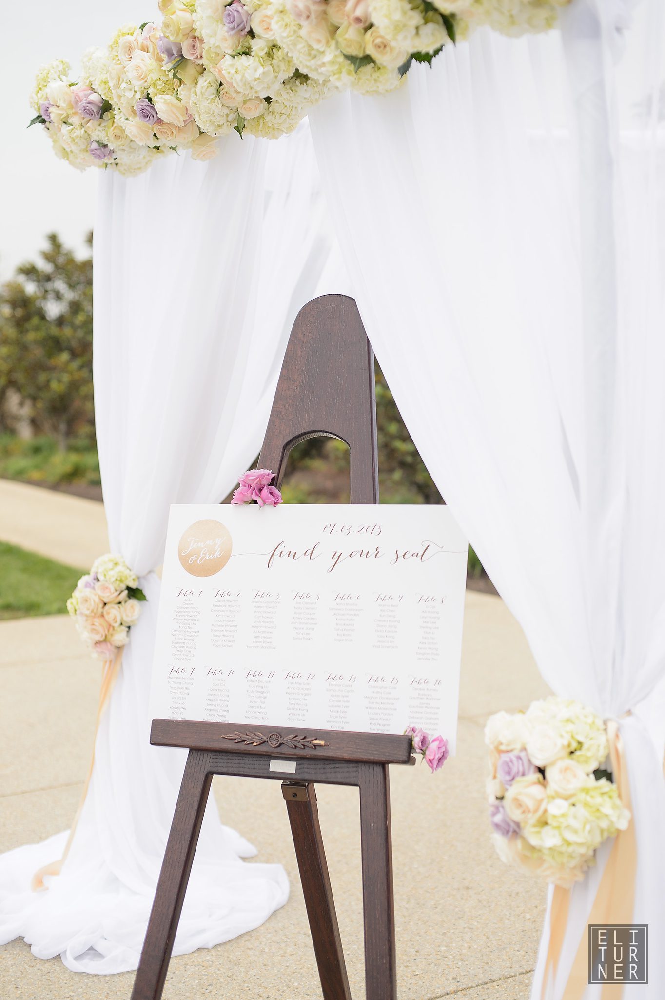 This Chuppah structure also serves as an arch. Floral tie-backs at the Salamander Resort and Spa. Photography by Eli Turner.