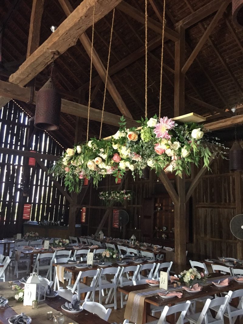 The barn at the Riverside on the Potomac offers exciting opportunities to raise the visibility of your wedding flowers