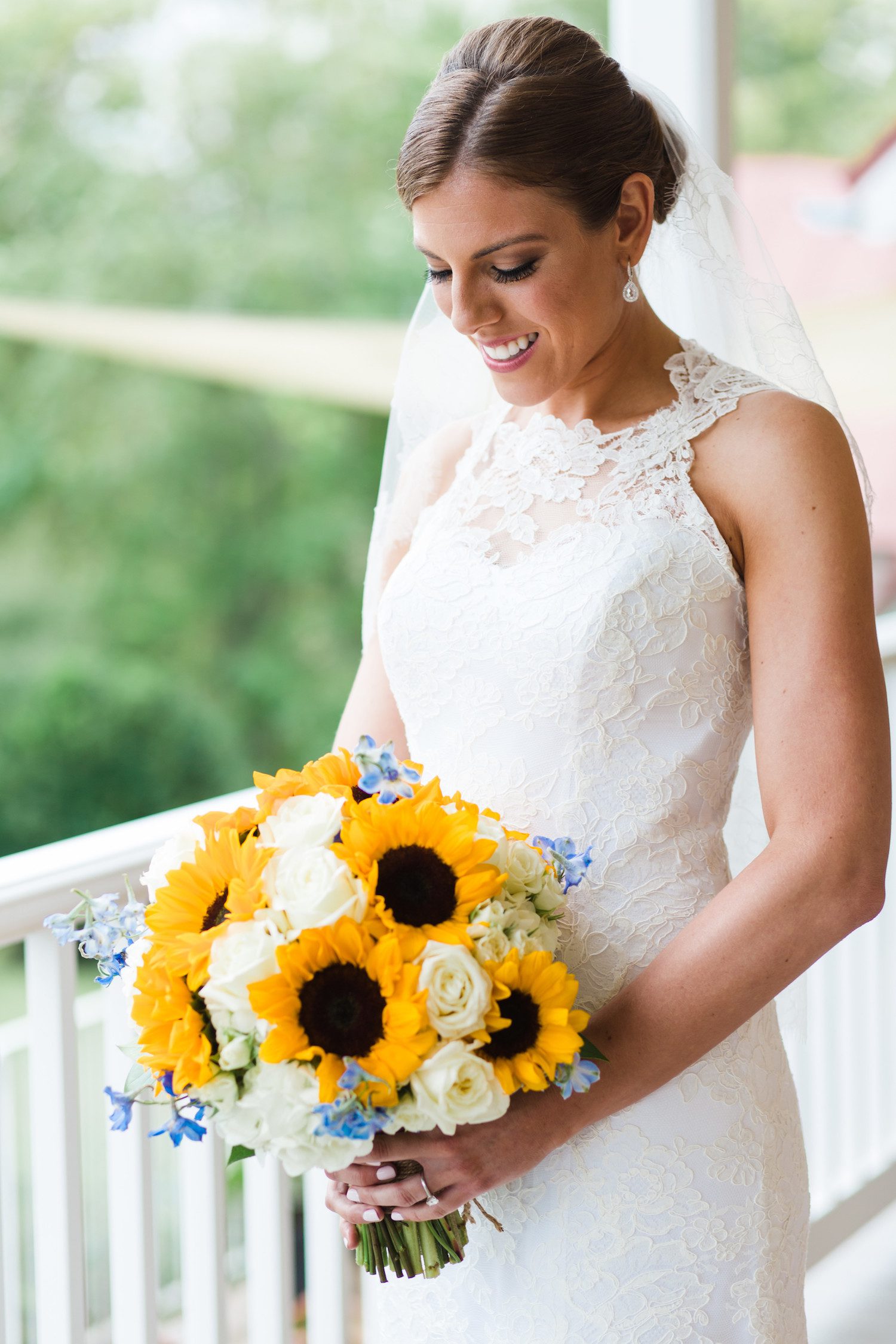 Delphinium with Sunflower and Polo Roses. Photography by Lauren D. Rogers.