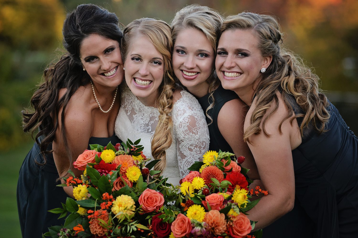 Fall-themed-orange-red-yellow-bridal-bouquets.JPG