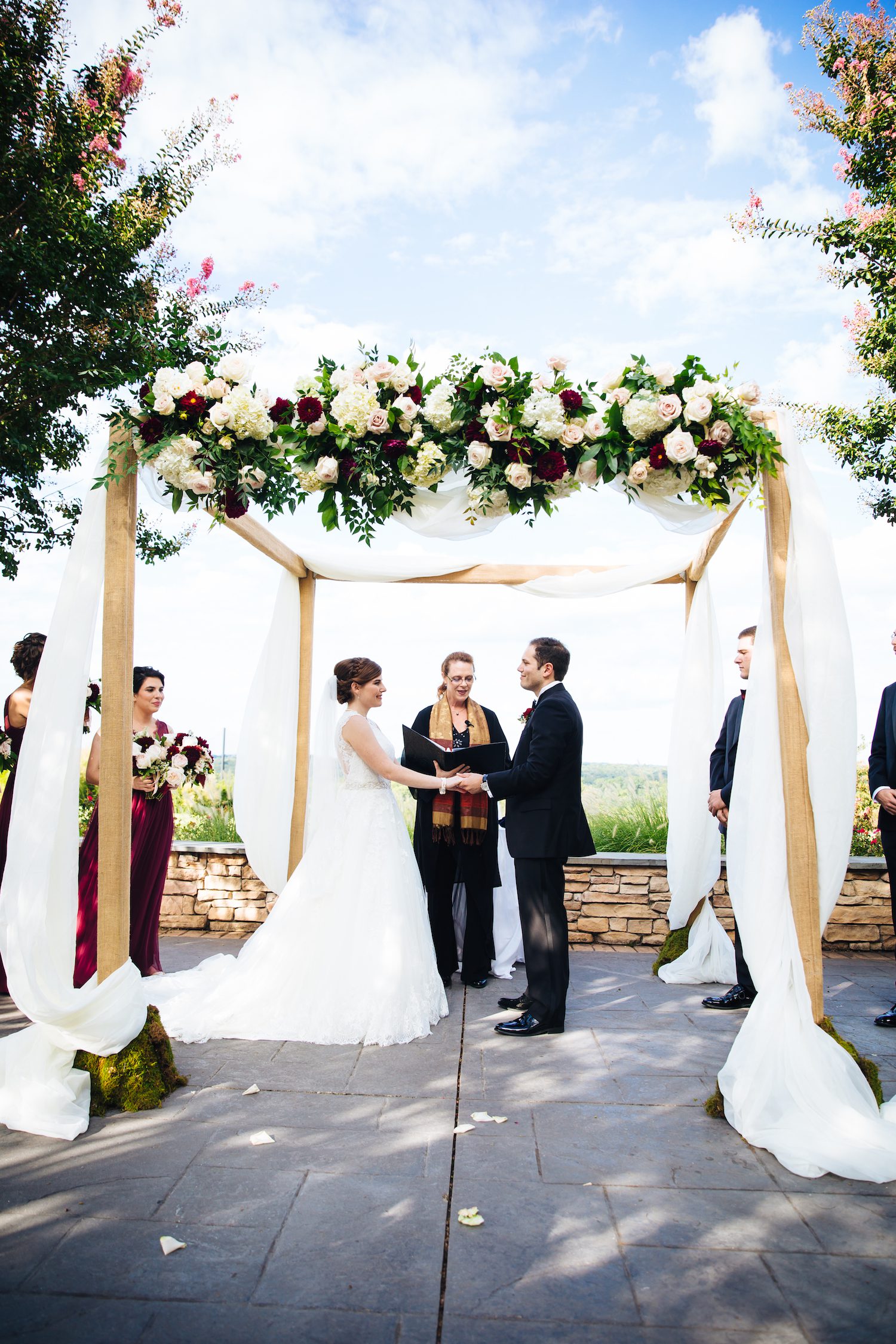 Sheer fabric serves as a canopy. Photography by Life Gallery Studios.