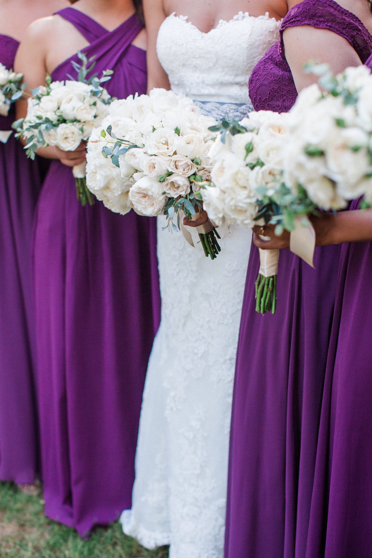 White Cloud Garden Roses make up this entire J. Morris Flower bridal bouquet. Photography by Birds of a Feather Photography.