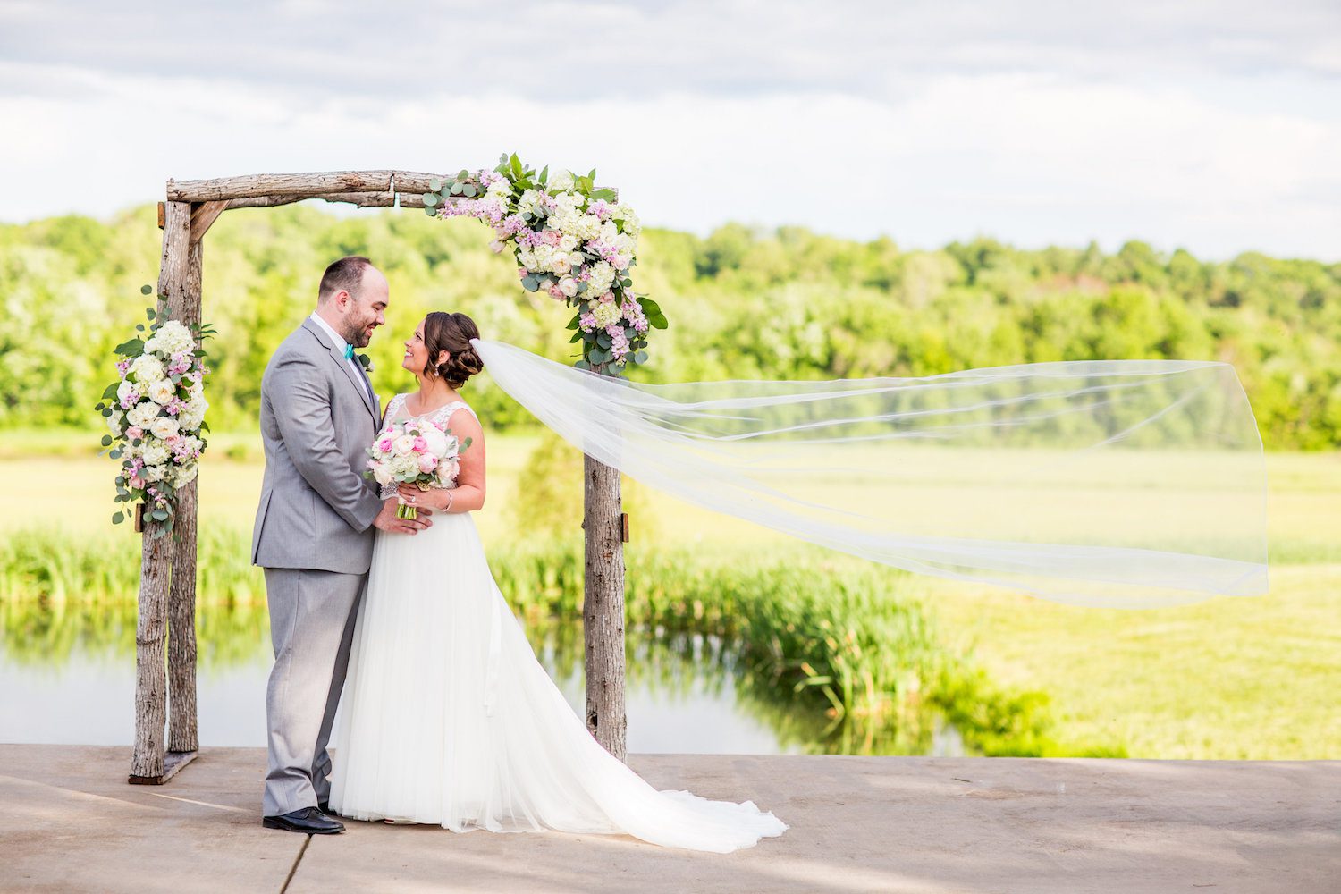 This is an on-site arch at Riverside on the Potomac. This is a partial floral arch. Photo by KayPea Photography.