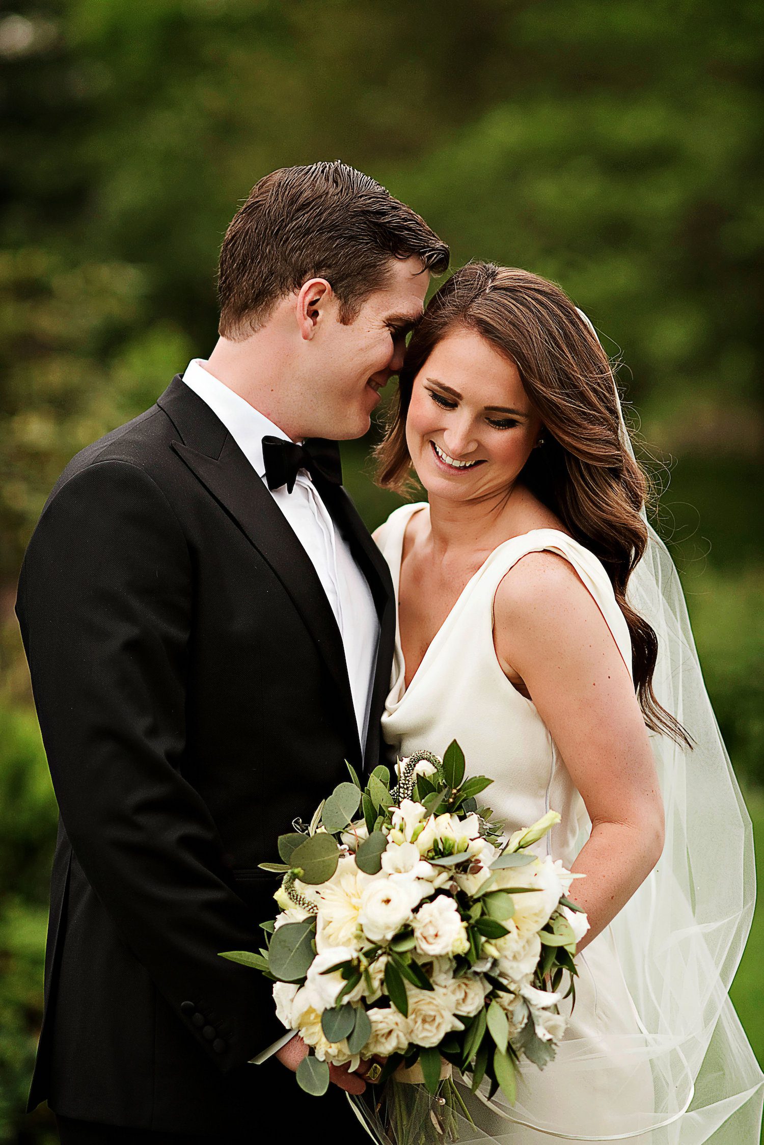 Andrew and Kayla share a moment… and her bouquet.