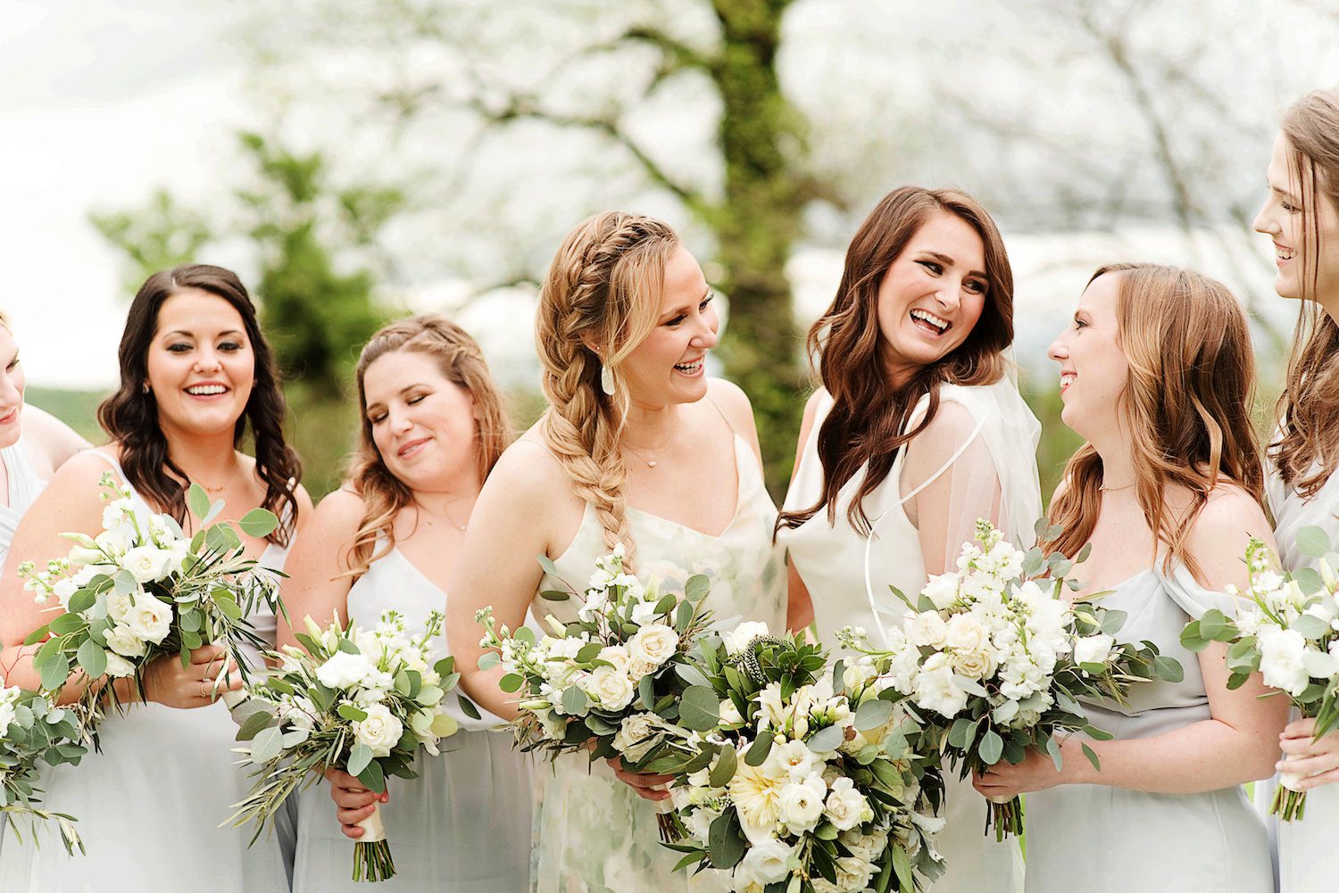 Light grey bridesmaids dresses perfect for this neutral palette. Photography taken at Raspberry Plain Manor in Leesburg, Virginia by the Photography Smiths.