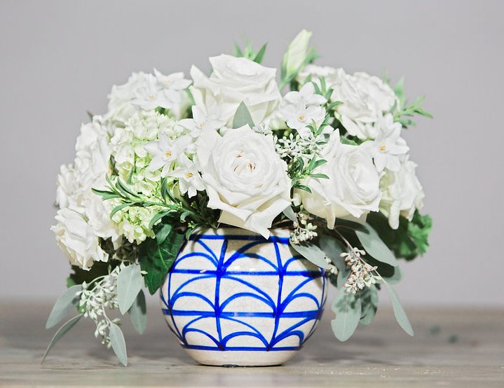 "Waking" includes Paperwhite and Lisianthus, two unique varieties in a geometric patterned vase.