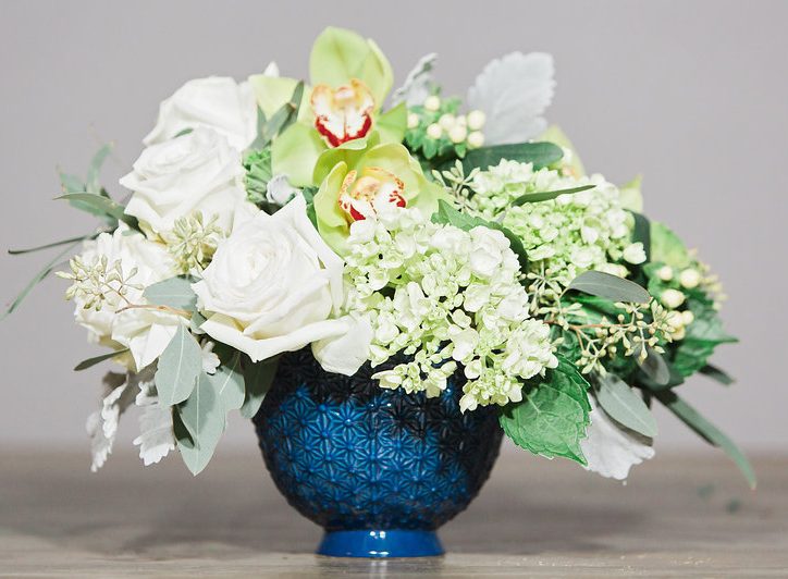 "Snow" is the smaller of the two arrangements in the blue Pierre Compote.