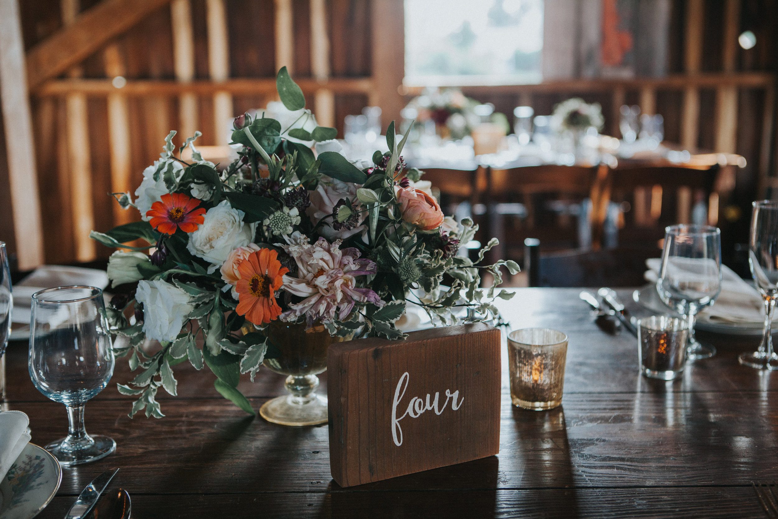 This bride's favorite flowers became the focal point of her arrangements. Silverbrook Farm, Virgina. Photography by Purple Fern.
