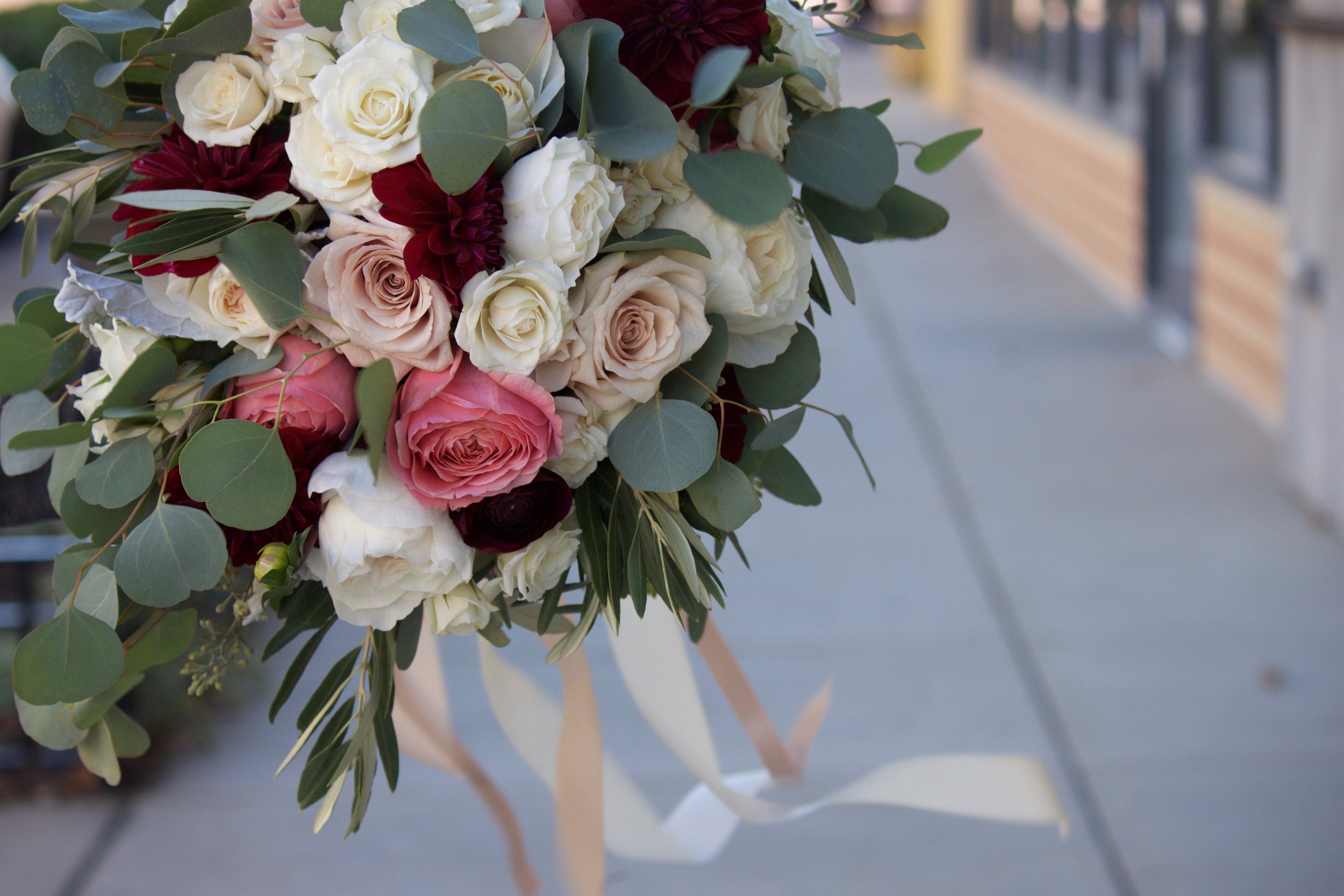 Greeneries are the common element between floral bouquets and "greens-only" accents.