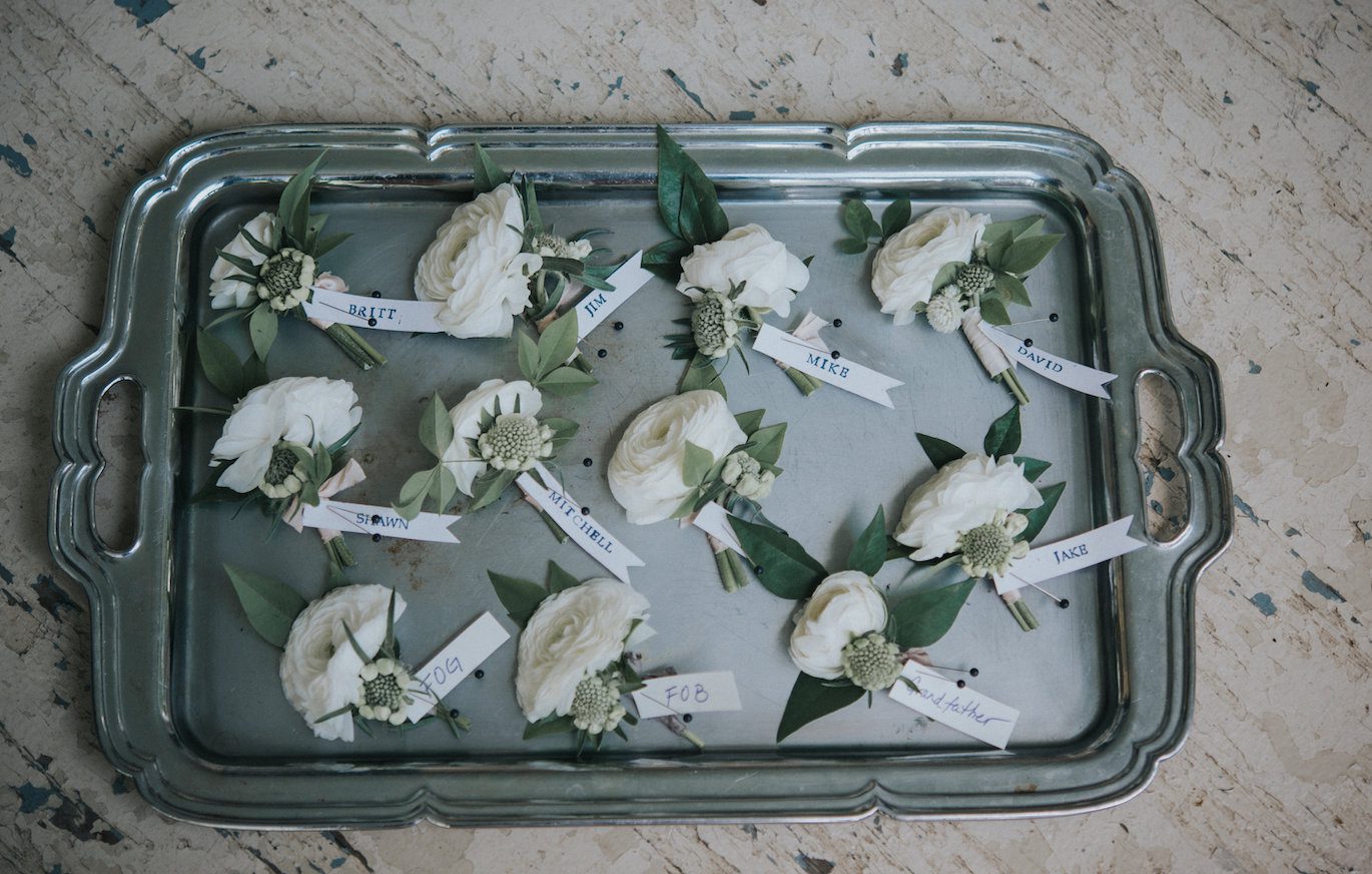 Our designer Katie added an elegant touch to her organization by labelling and displaying the boutonnieres on an antique silver tray. No worries-no mistakes. Photography by The Purple Fern.