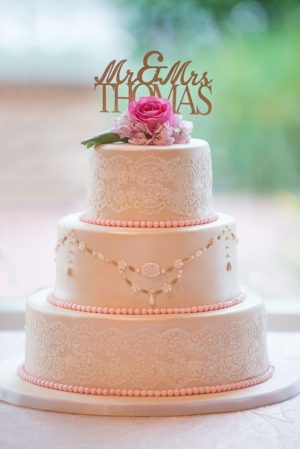 Fondant icing and fresh flower topping. Photography by Megan Schmitz.